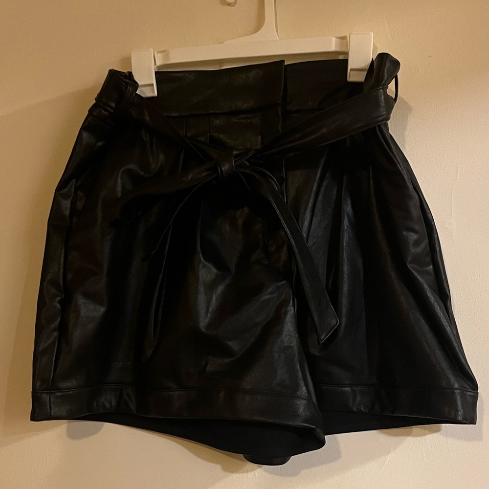 Belted black leather shorts